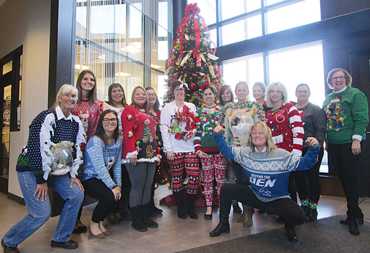 Allan Blanks/MDN Fierce competition took place at the WArd County Auditors office Thursday morning, as contestants put forth their ugliest Christmas sweaters.